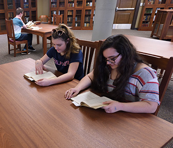 Visitors in an archival reading room